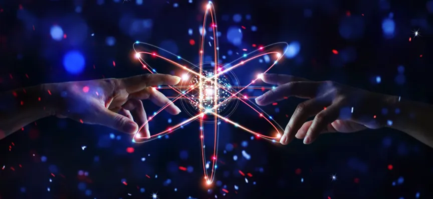 Two hands reaching toward each other with a glowing atom-like digital structure between them.